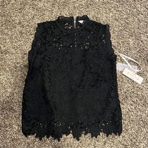 Brand new with tags sleeveless top size large Nadette with tags retails for $98